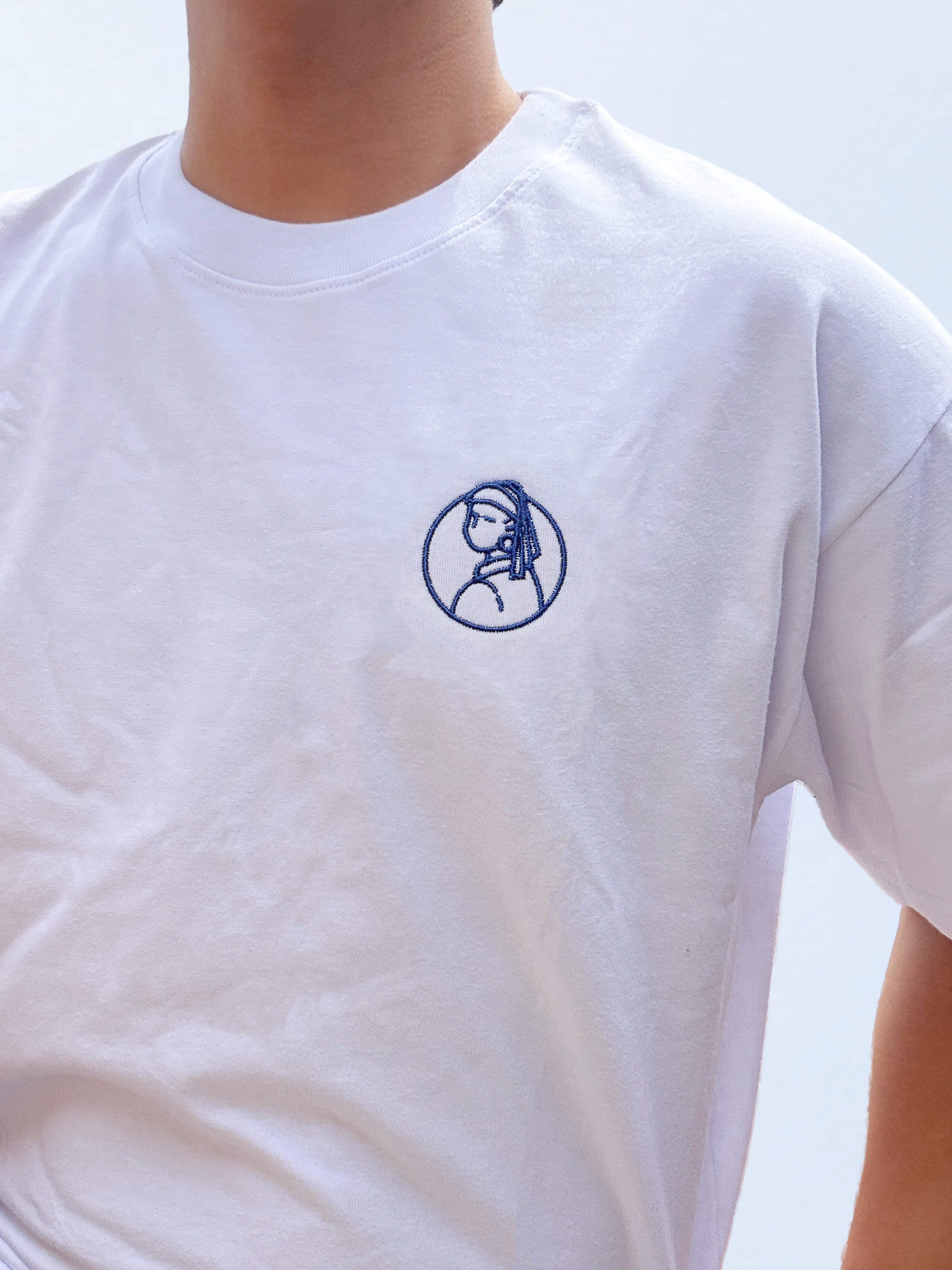 La Joven de la Perla (Emblema)